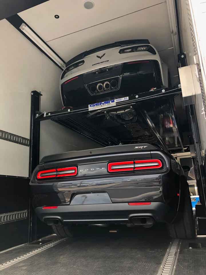 Car shipping service using auto transport truck on highway